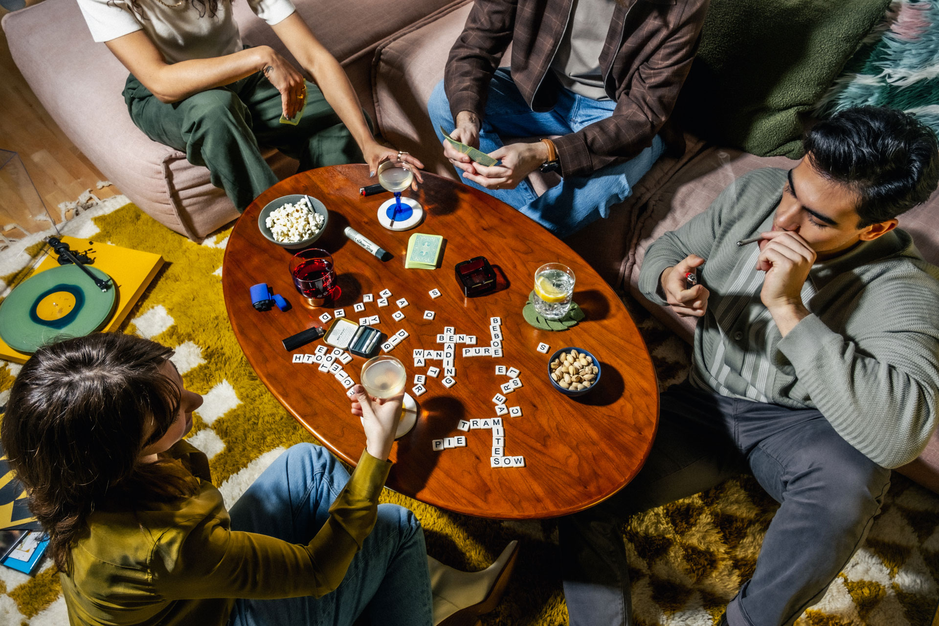 A group plays board games and consumes cannabis